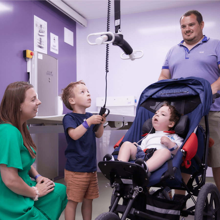 Cotswold Farm Park Changing Places Toilet - a family using the facilities