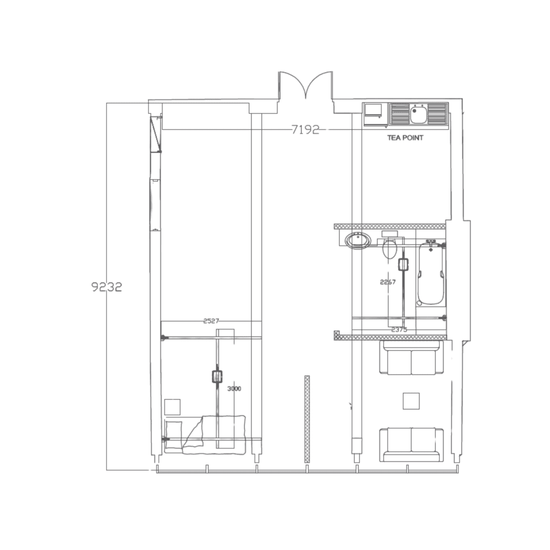 a room with a stretcher and a wall